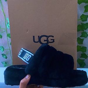 Black Ugg slides